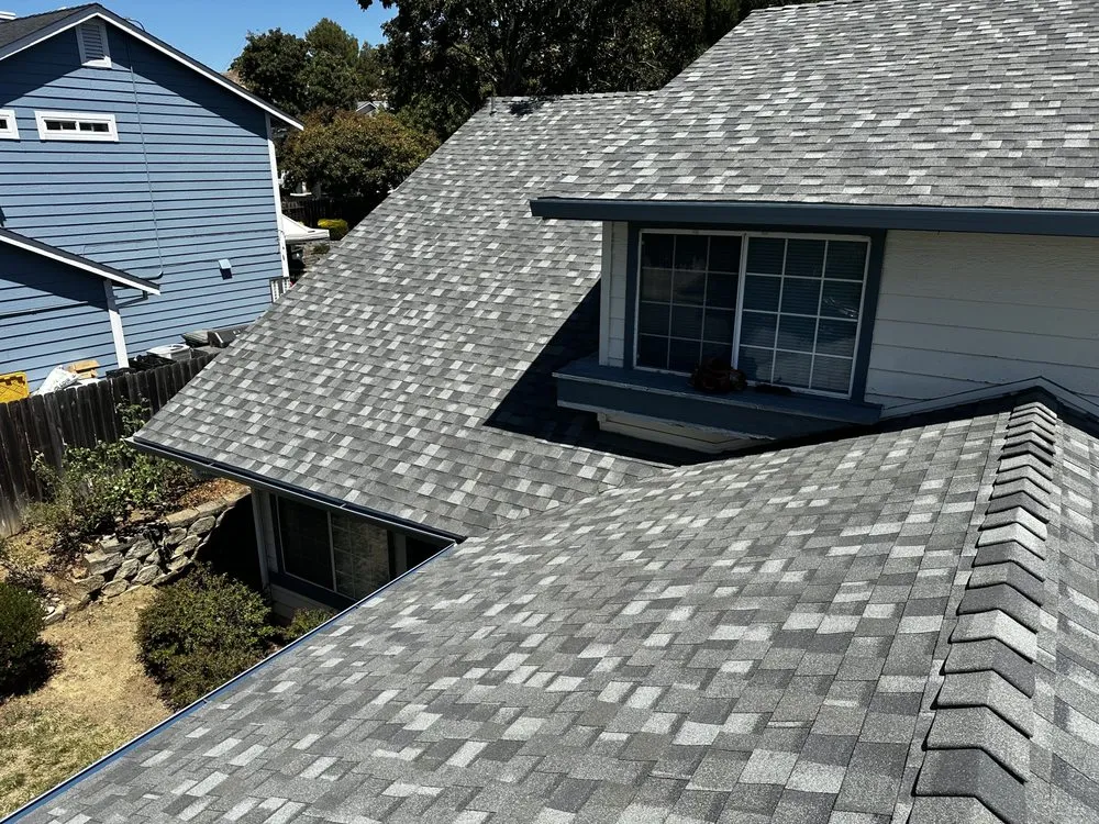 Slide of McMillan Roofing