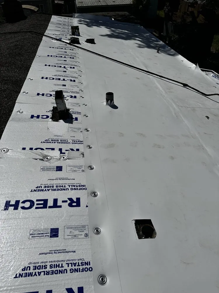 Slide of McMillan Roofing