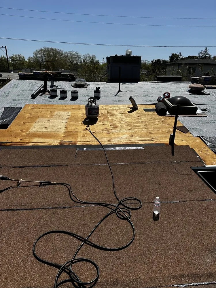 Slide of McMillan Roofing