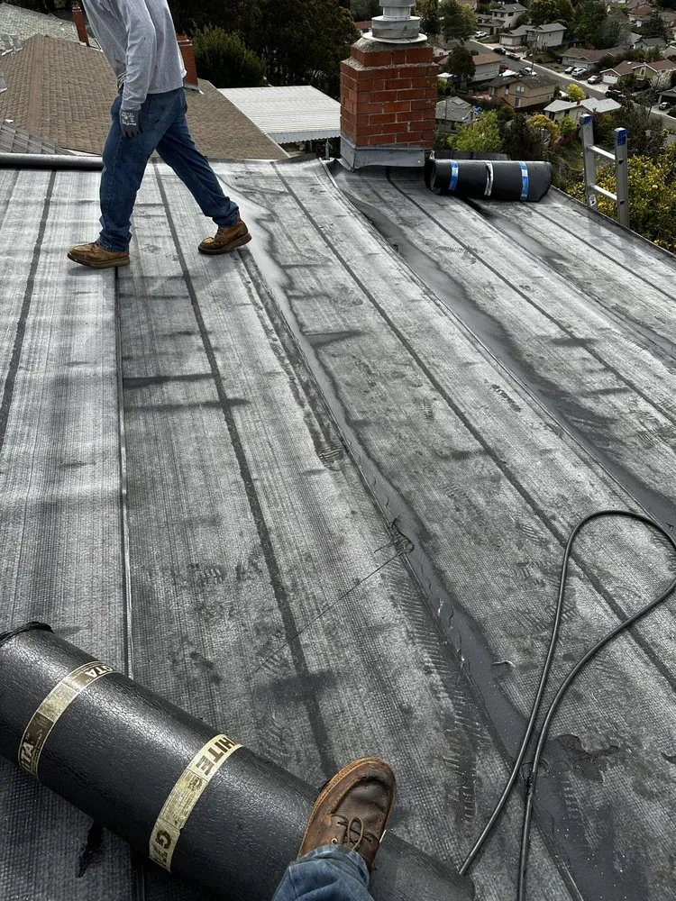 Slide of McMillan Roofing