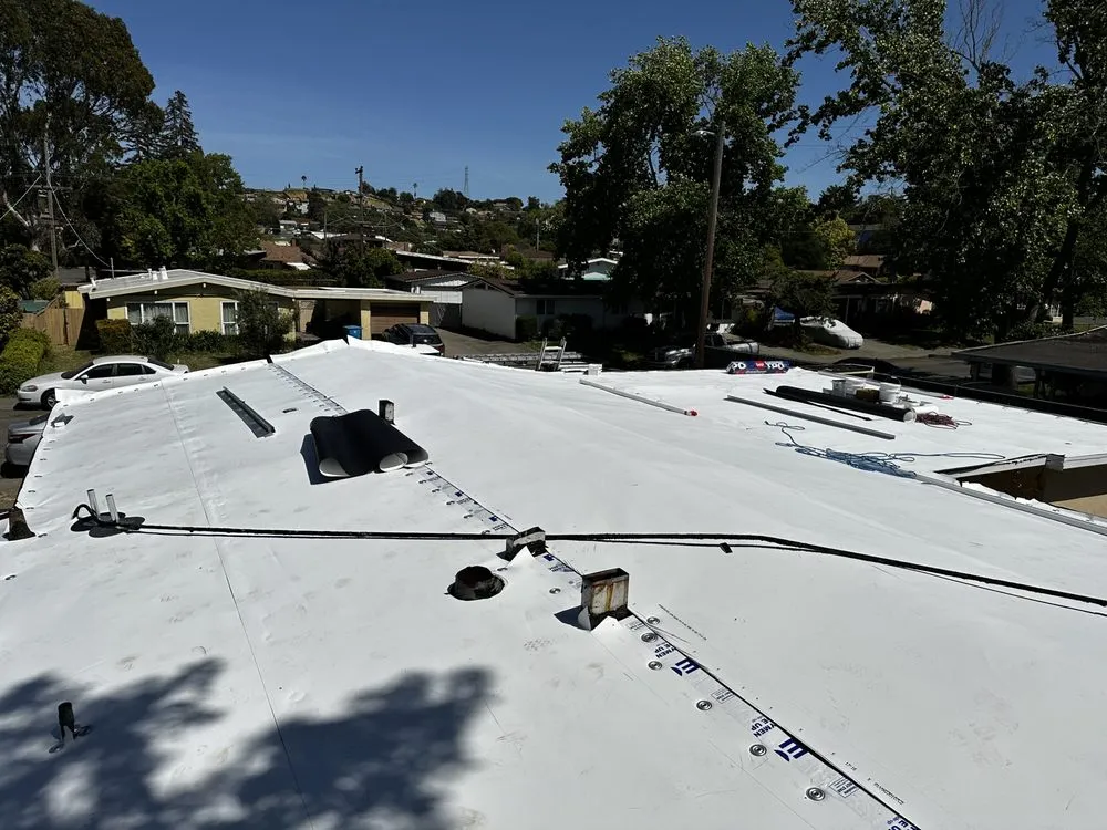 Slide of McMillan Roofing