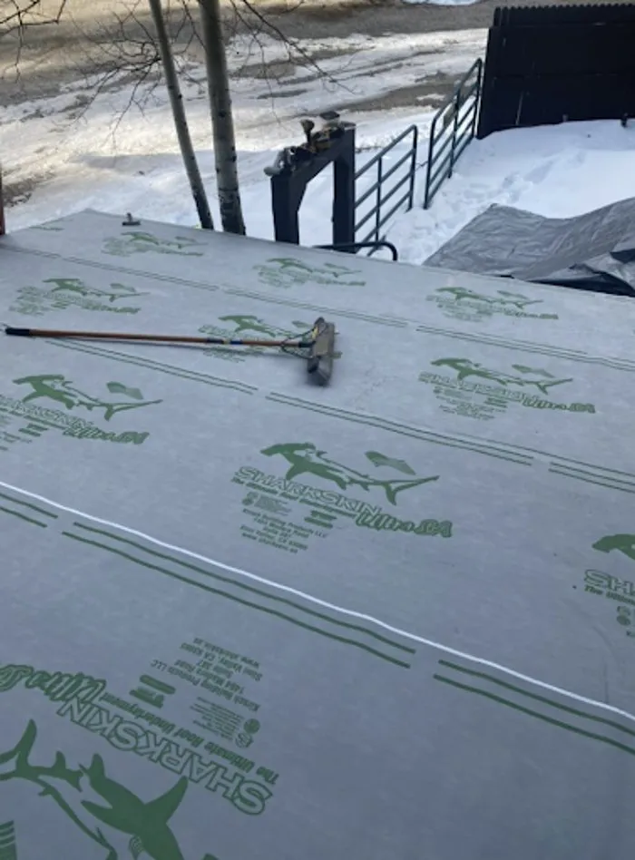 Slide of McPartlon Roofing