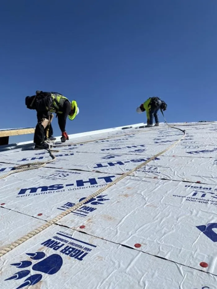 Slide of McPartlon Roofing