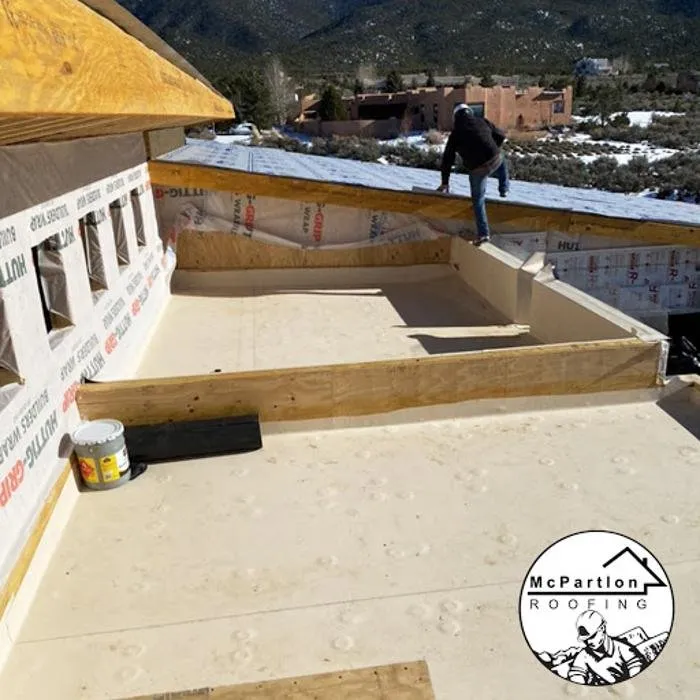 Slide of McPartlon Roofing