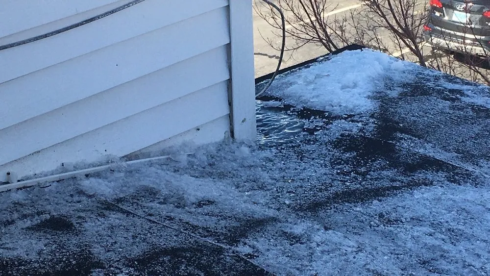 Slide of McPhail Roofing