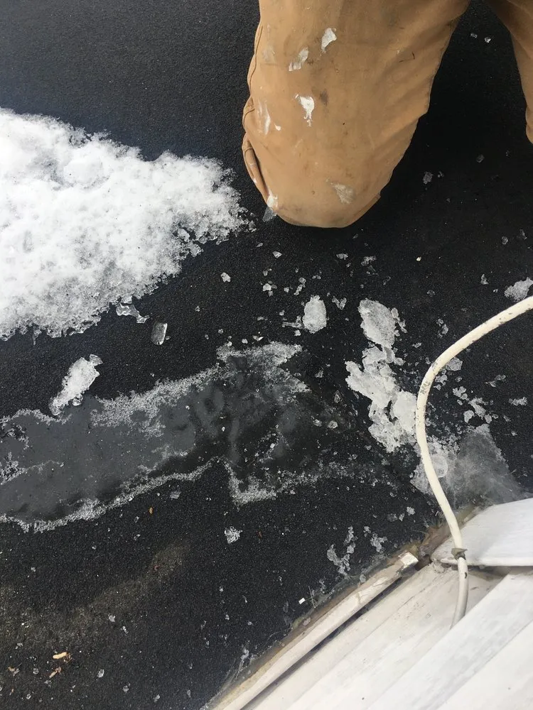 Slide of McPhail Roofing