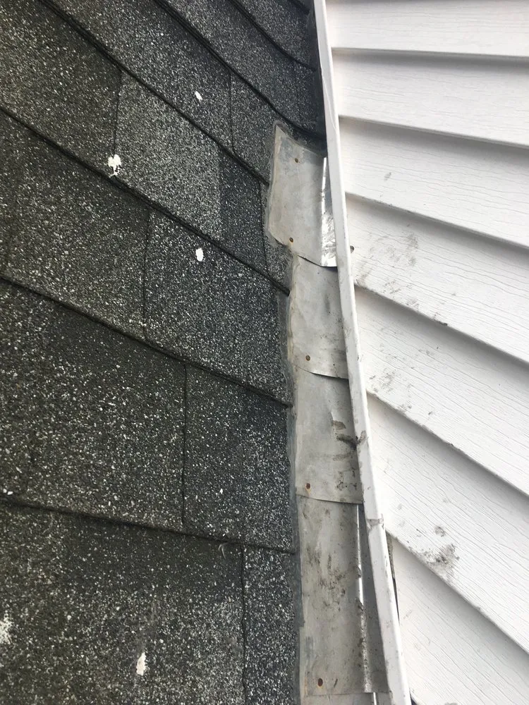 Slide of McPhail Roofing