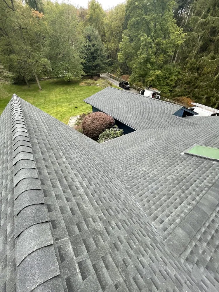 Slide of M&D Roofing