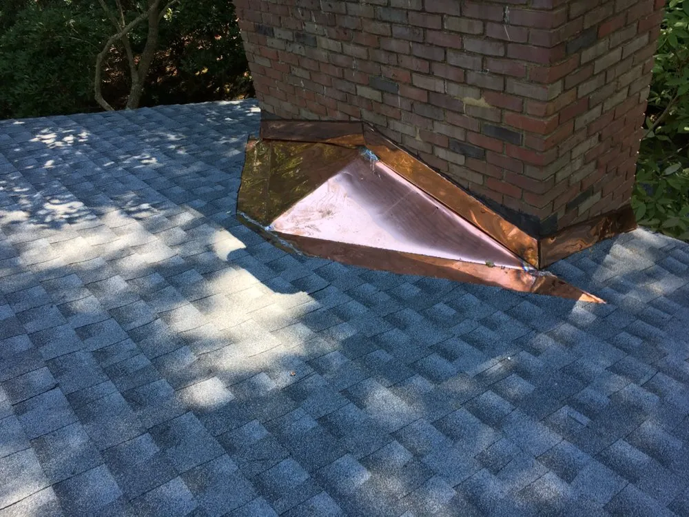 Slide of M&D Roofing