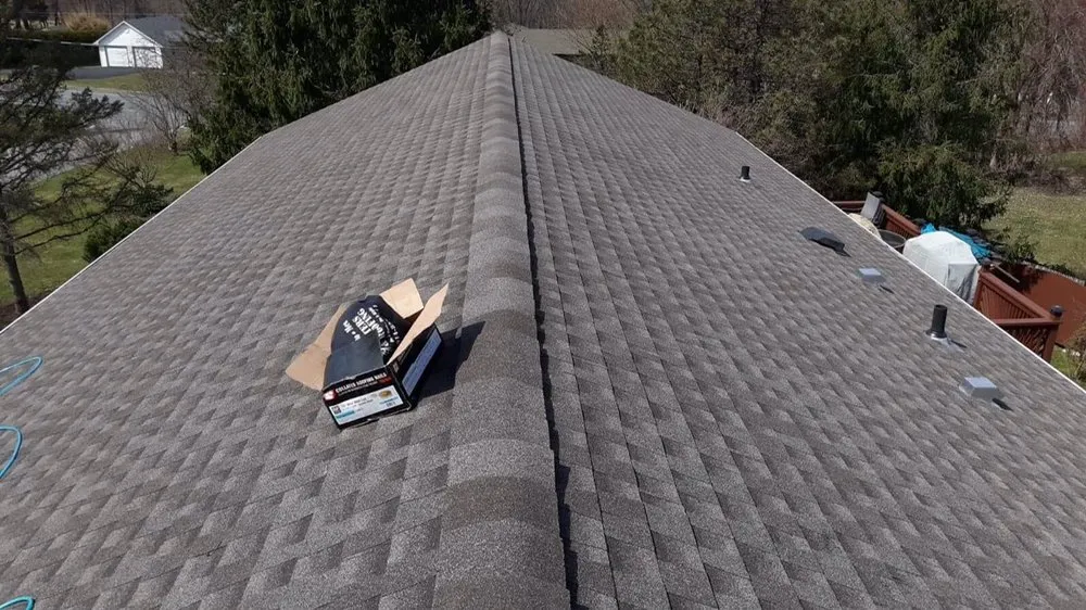 Slide of M&D Roofing