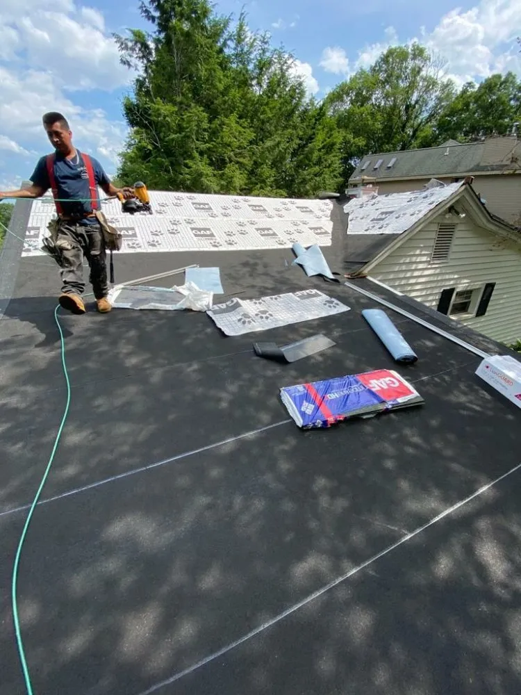 Slide of M&D Roofing