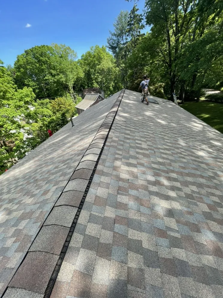 Slide of M&D Roofing