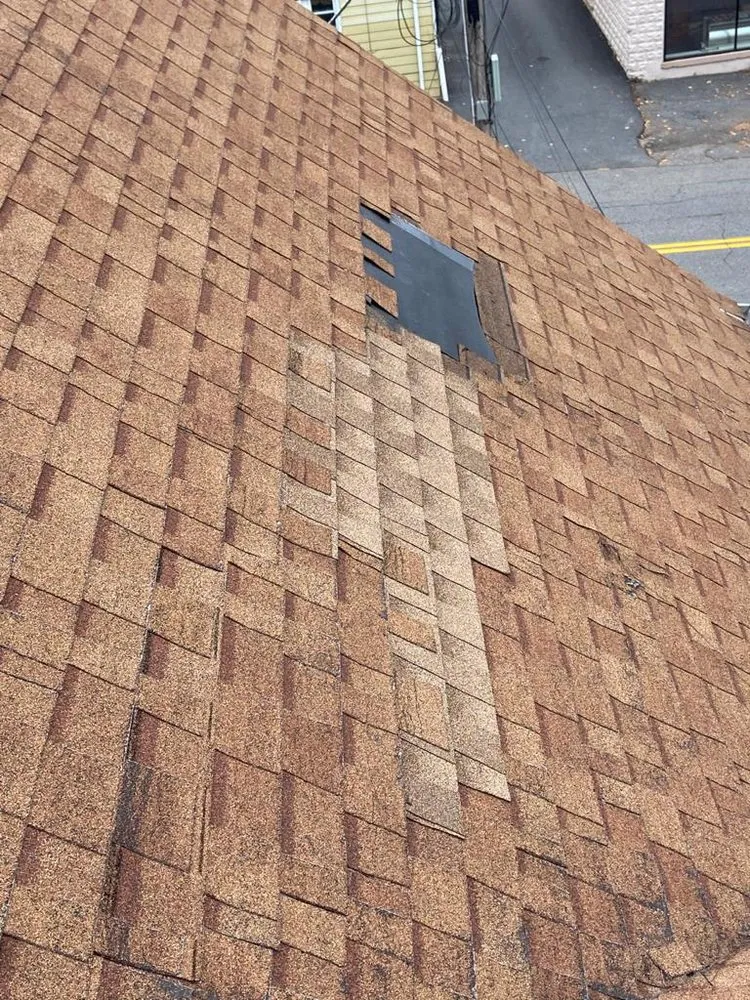 Slide of M&D Roofing