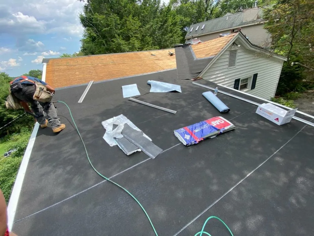 Slide of M&D Roofing