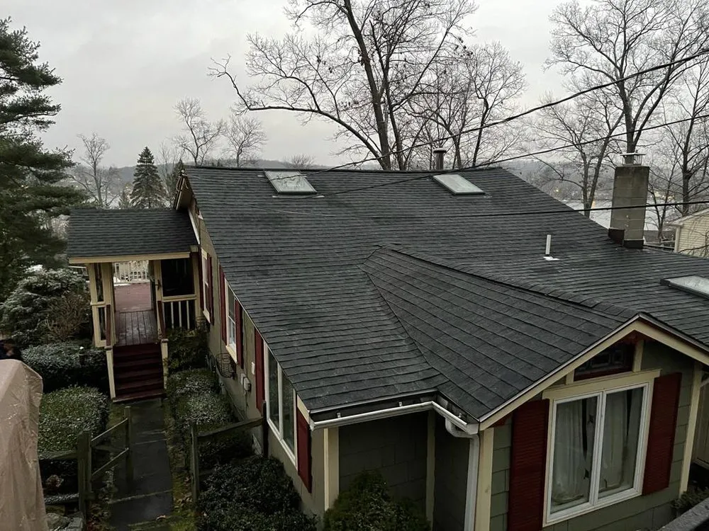 Slide of M&D Roofing