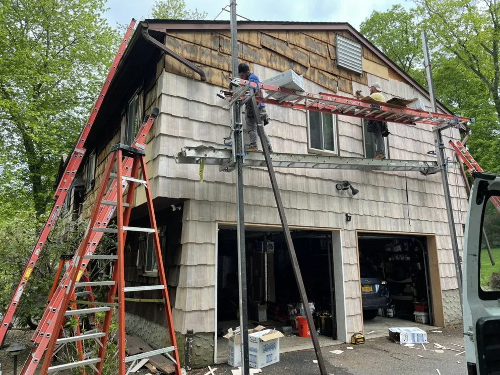 Slide of M&D Roofing