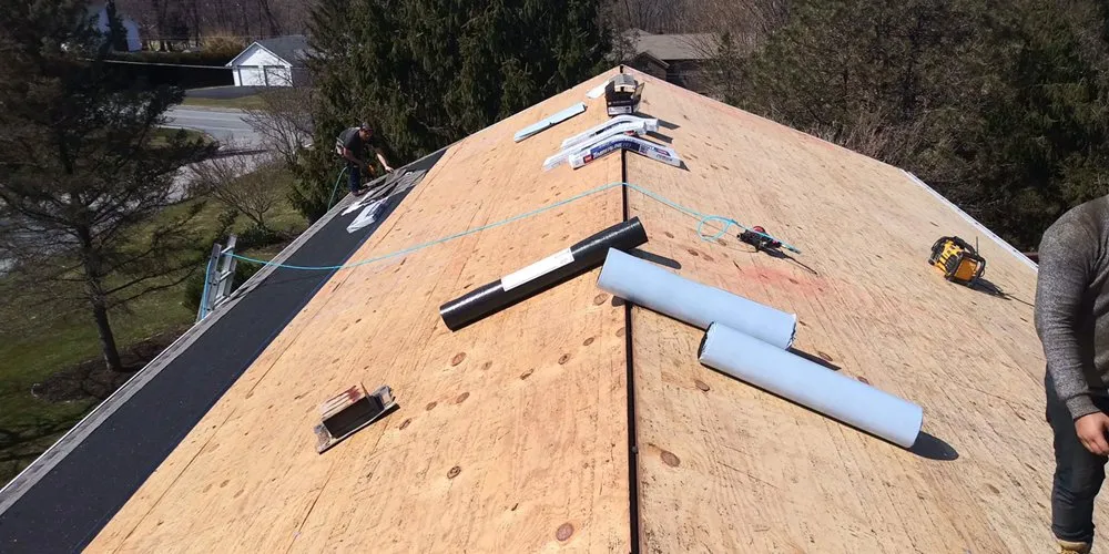 Slide of M&D Roofing