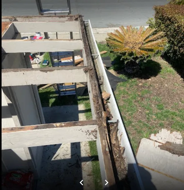 Slide of M&D Roofing Service