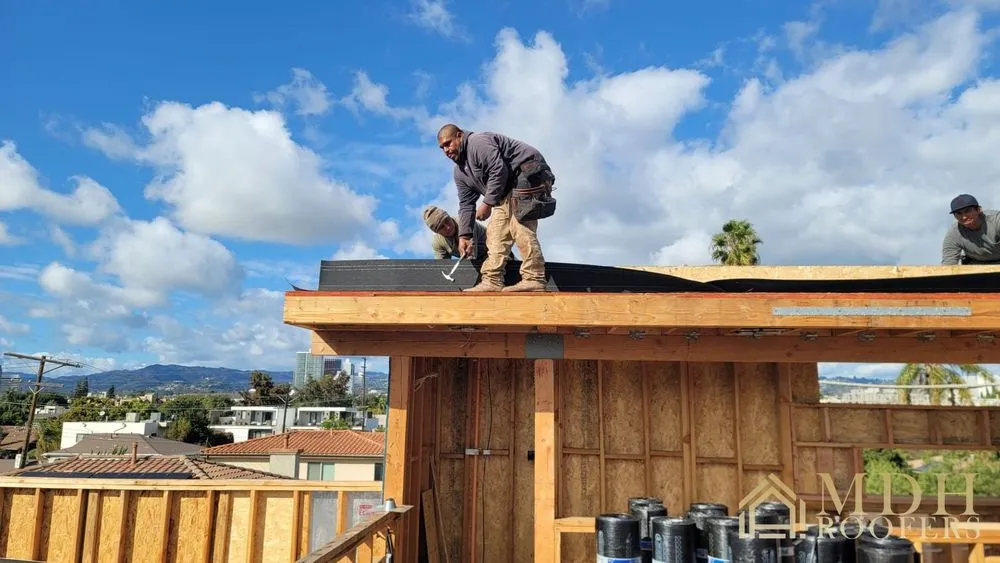 Slide of MDH Roofers