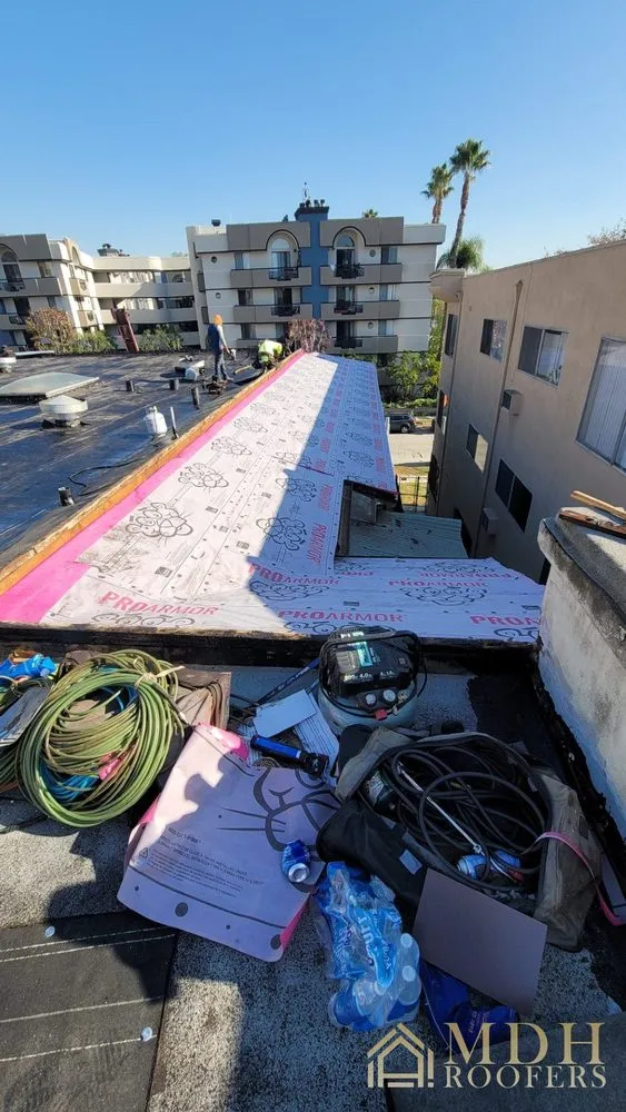 Slide of MDH Roofers