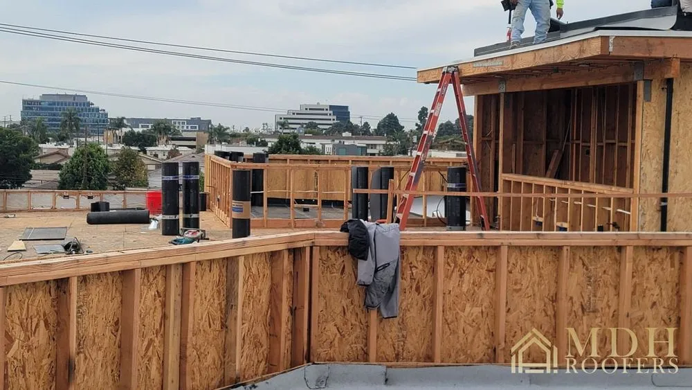 Slide of MDH Roofers