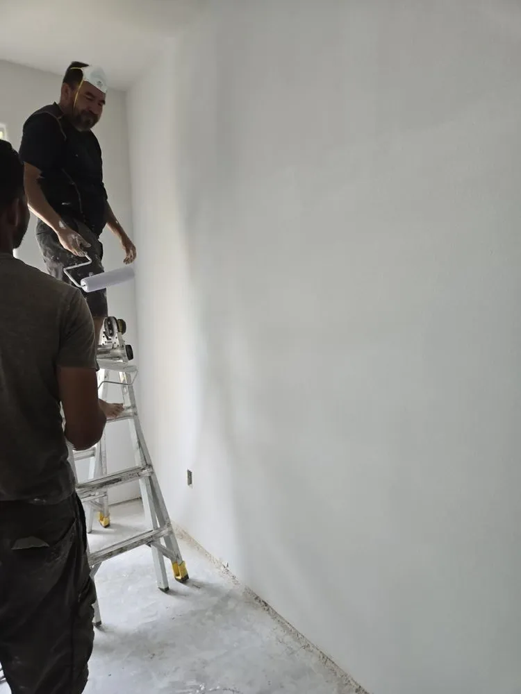 Slide of ME Roofing Company