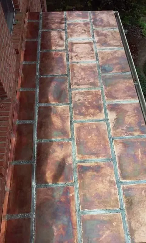 Slide of Mecklingburg Roofing&Masonry