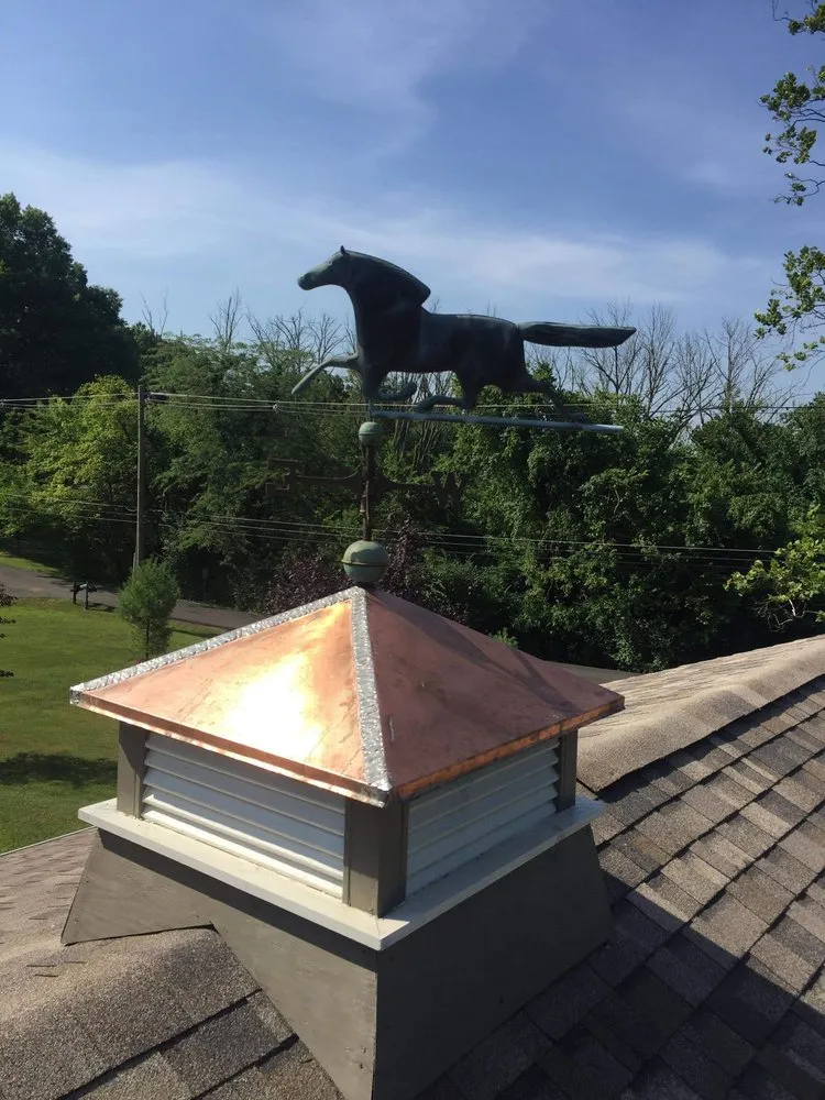 Slide of Mecklingburg Roofing&Masonry