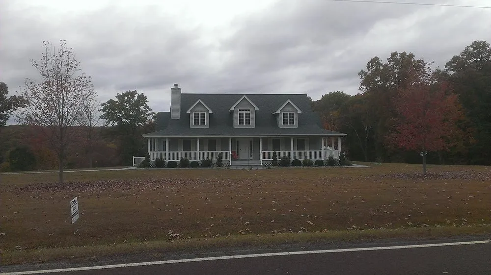 Professional roof repair in Ofallon, MO by Medlin Roofing & Construction