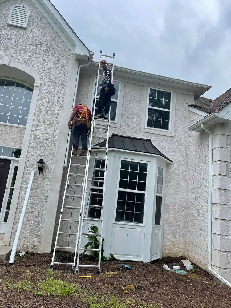 Slide of Mega Roofing & Siding Contractor