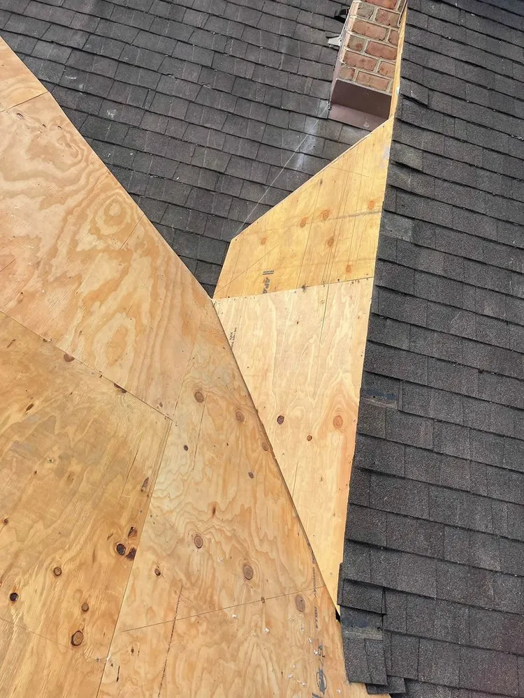 Slide of Mega Roofing & Siding Contractor
