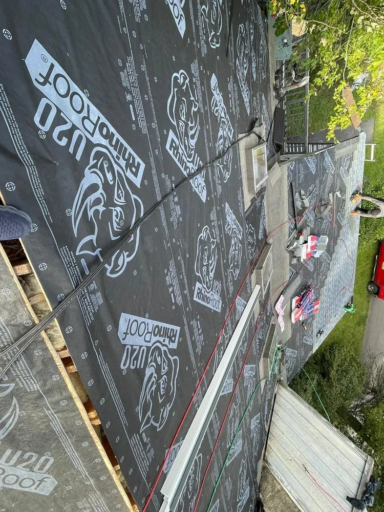 Slide of Mega Roofing & Siding Contractor