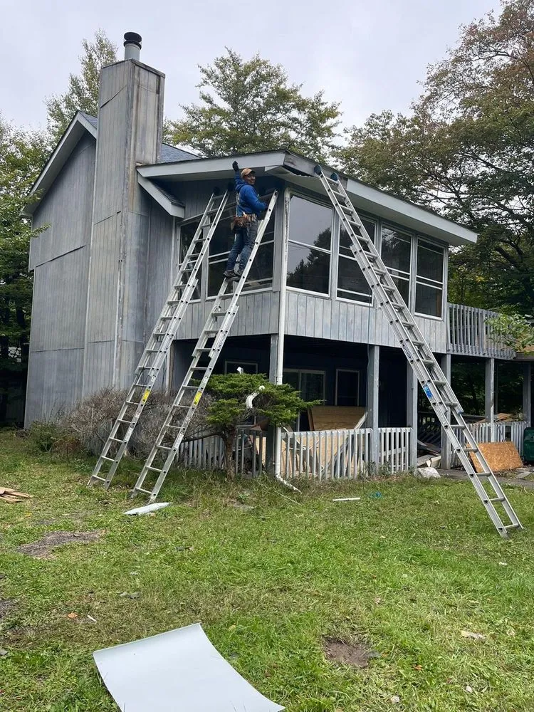 Slide of Mega Roofing & Siding Contractor