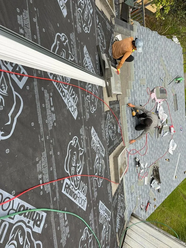 Slide of Mega Roofing & Siding Contractor