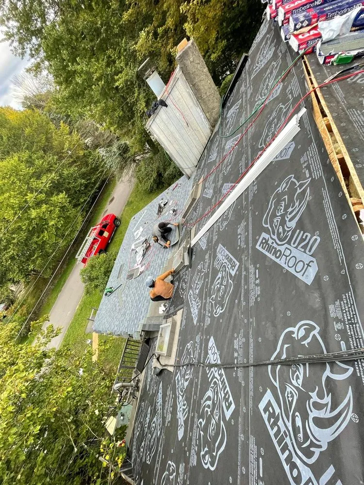 Slide of Mega Roofing & Siding Contractor