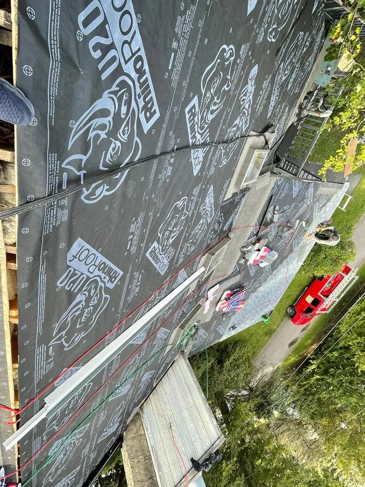 Slide of Mega Roofing & Siding Contractor