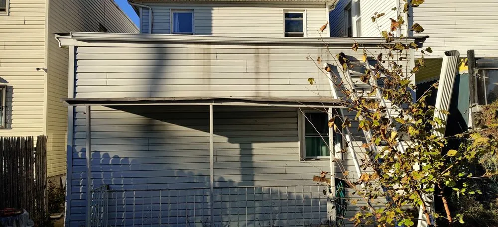 Slide of Megel Sons Roofing