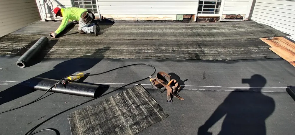 Slide of Megel Sons Roofing