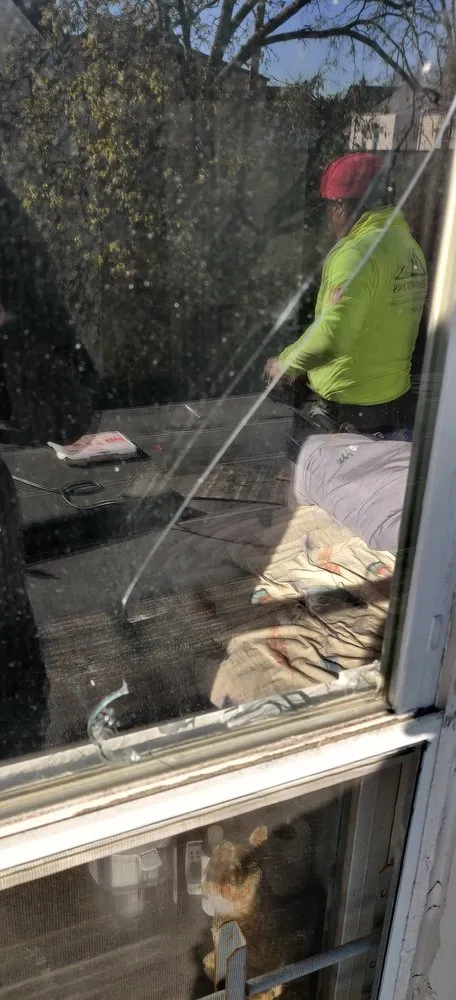 Slide of Megel Sons Roofing