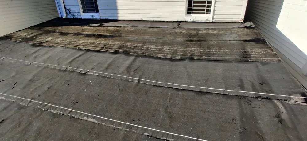 Slide of Megel Sons Roofing