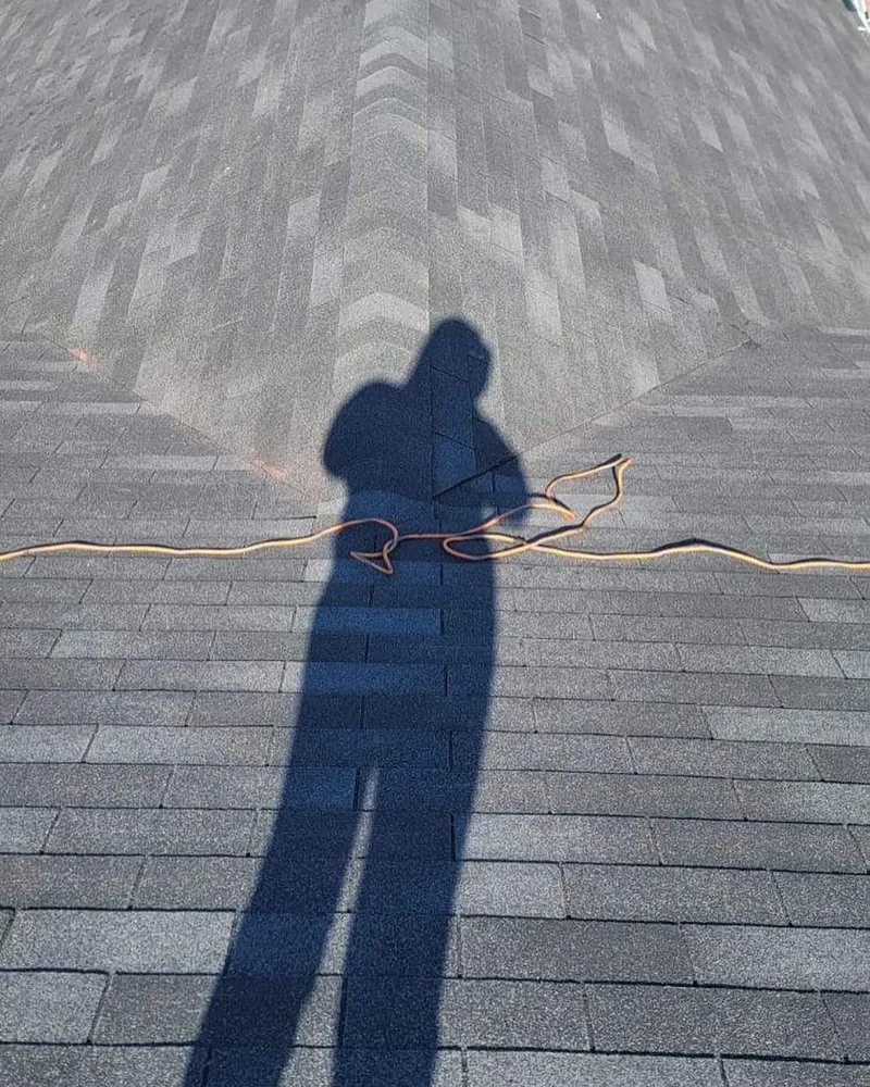 Slide of Megel Sons Roofing