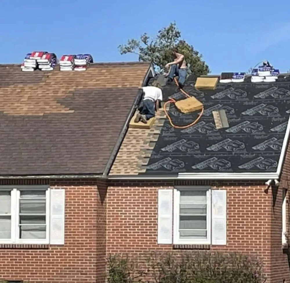 Slide of Megel Sons Roofing