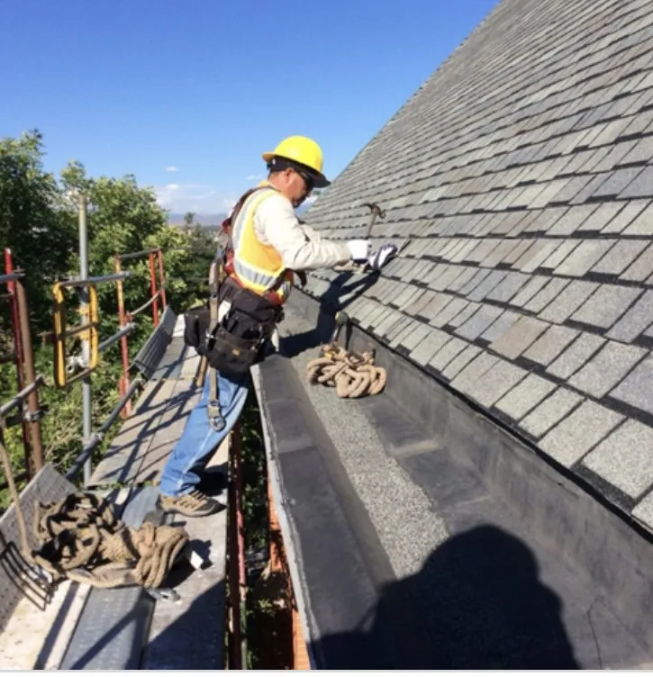 Slide of Megel Sons Roofing