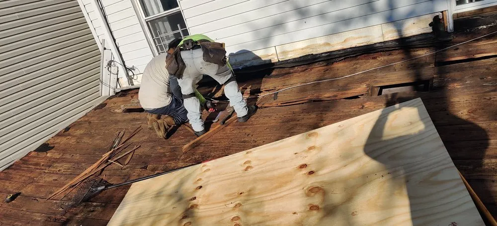 Slide of Megel Sons Roofing