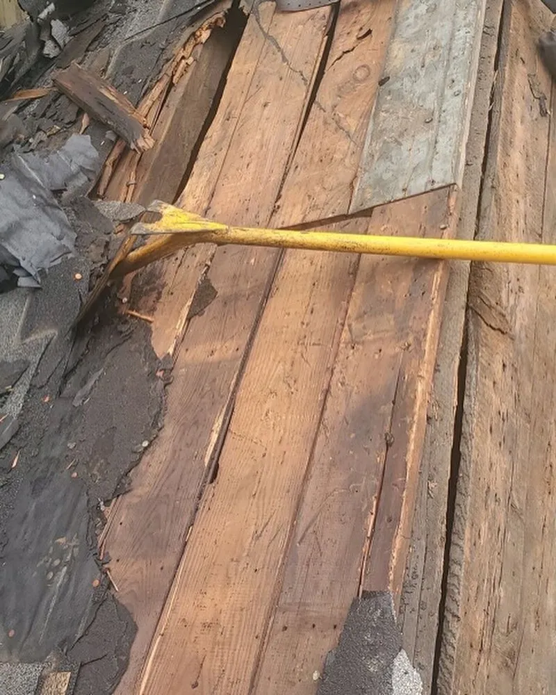 Slide of Megel Sons Roofing