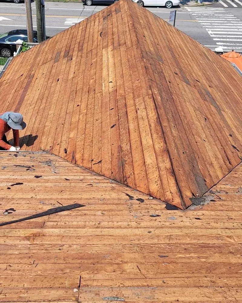 Slide of Megel Sons Roofing