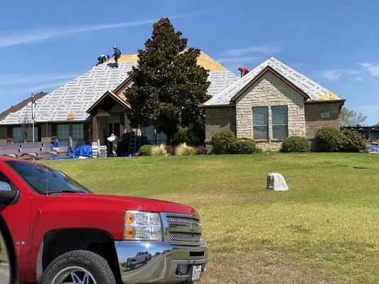 Meglins Roofing and General Contractor Logo