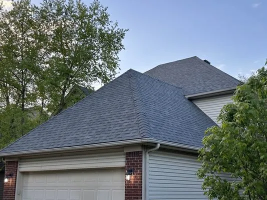 Mejia Roofing & Construction Logo