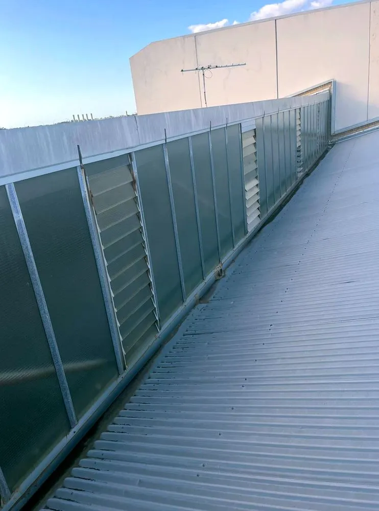 Slide of Melita Roofing