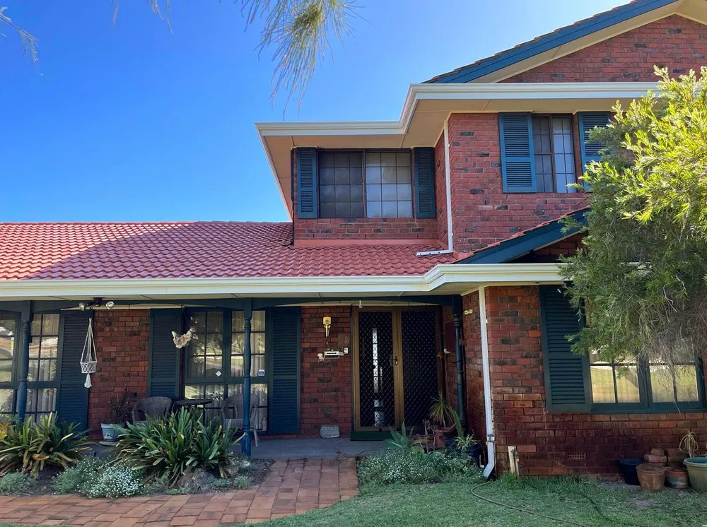 Slide of Melita Roofing